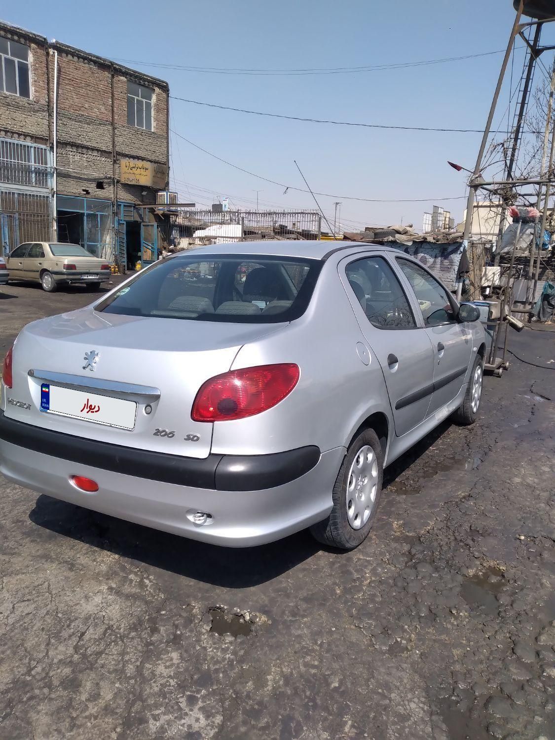 پژو ۲۰۶ صندوق دار v8 - 1399