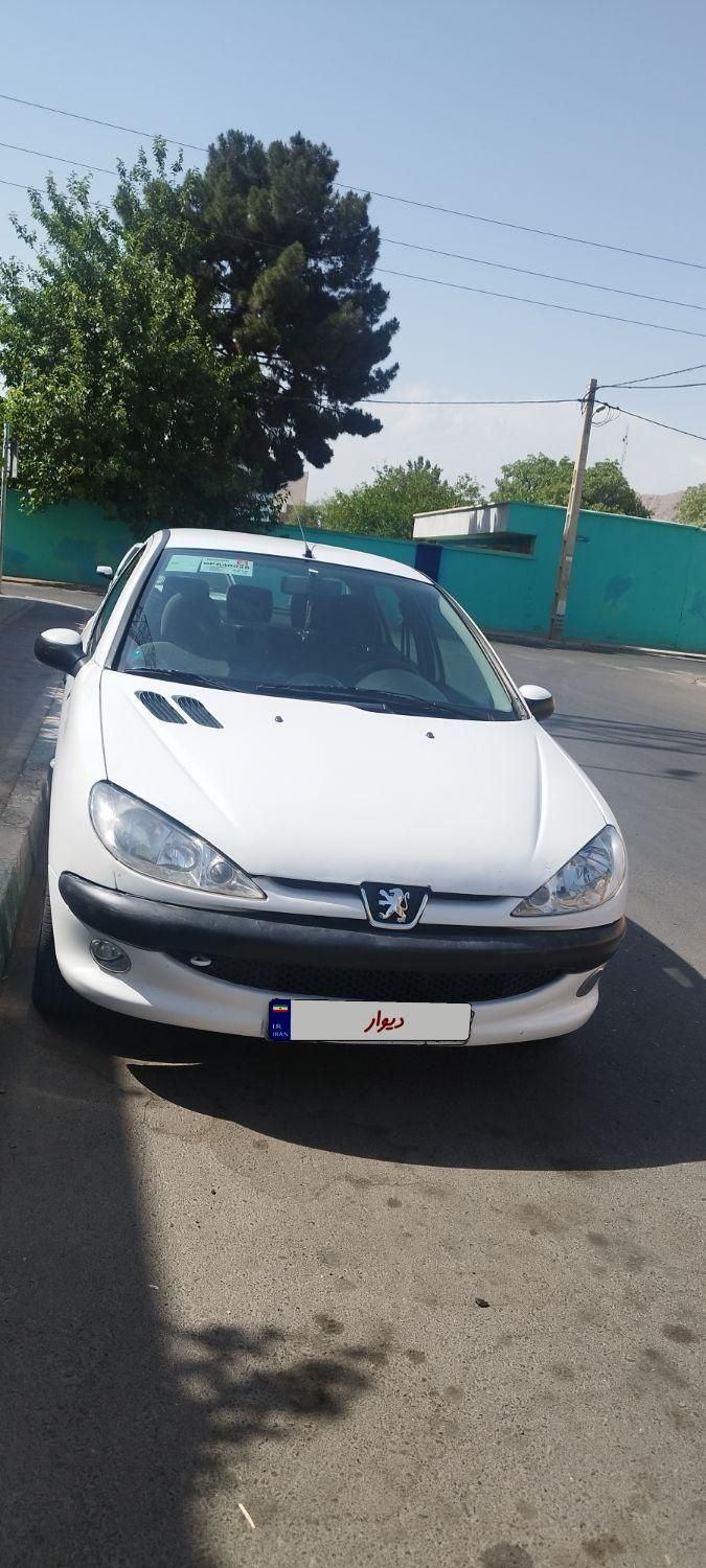 پژو ۲۰۶ صندوق دار v8 - 1396