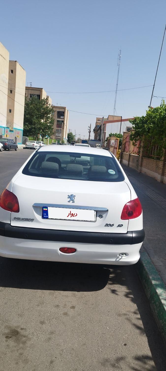 پژو ۲۰۶ صندوق دار v8 - 1396