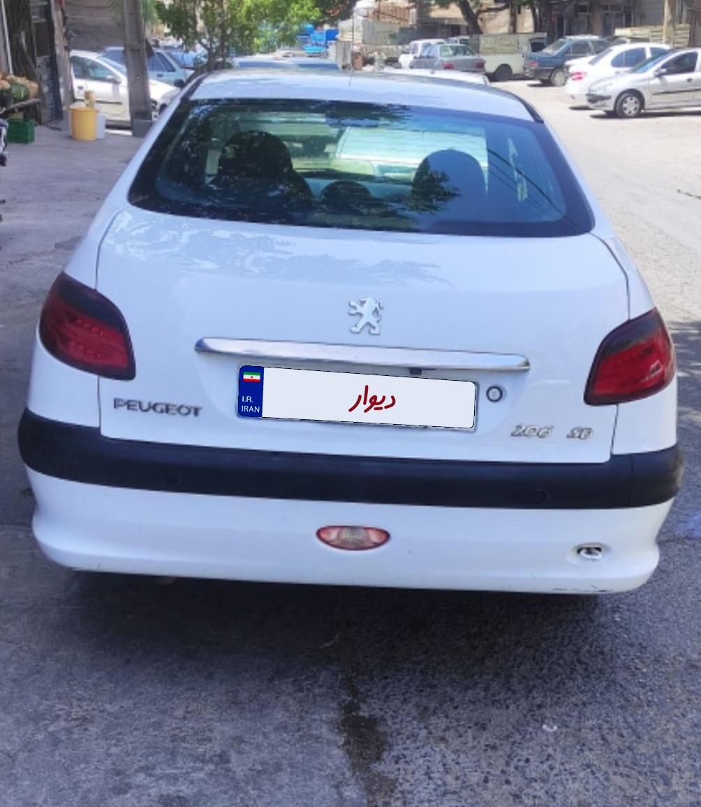 پژو ۲۰۶ صندوق دار v8 - 1393
