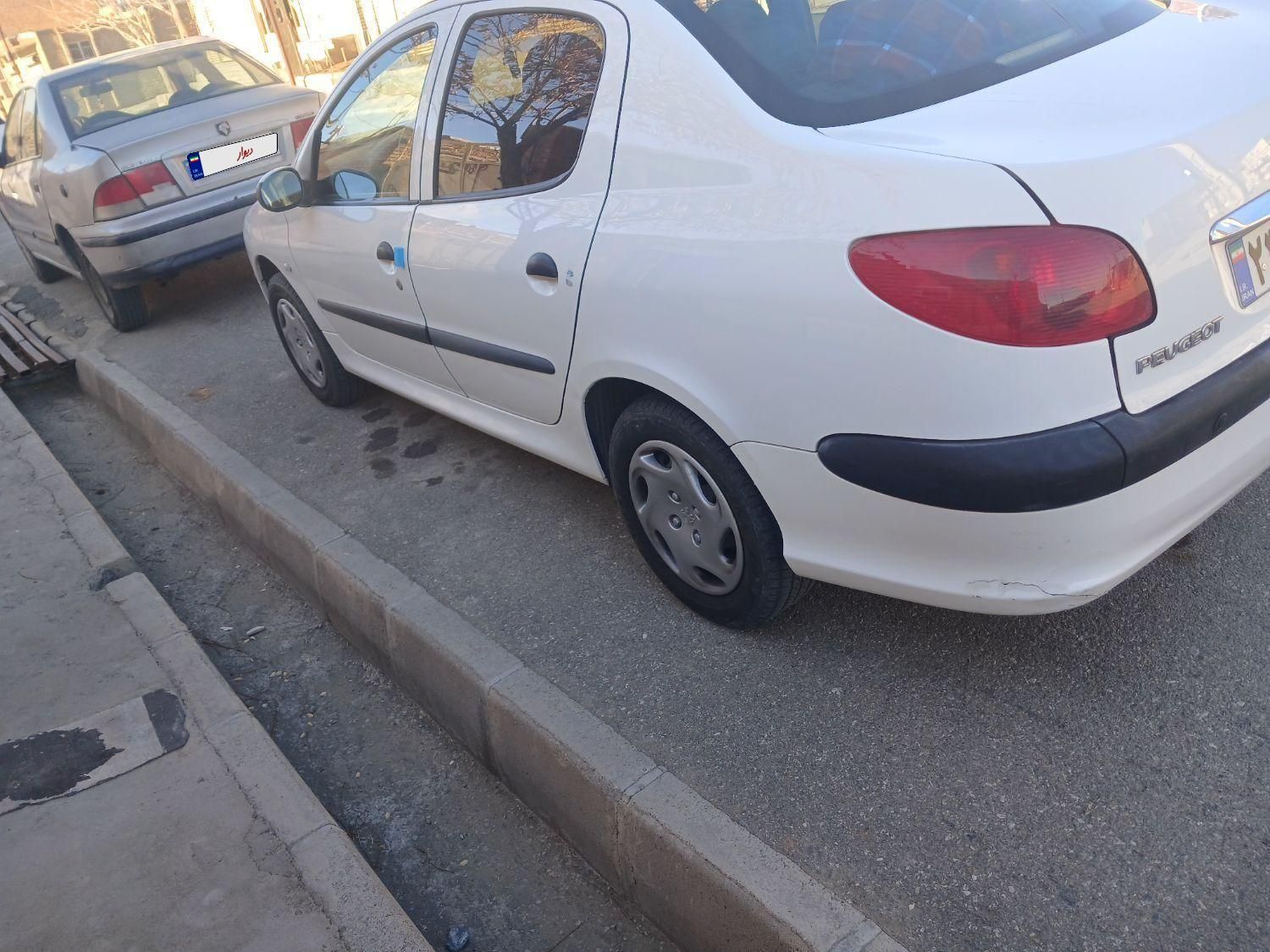 پژو ۲۰۶ صندوق دار v8 - 1396