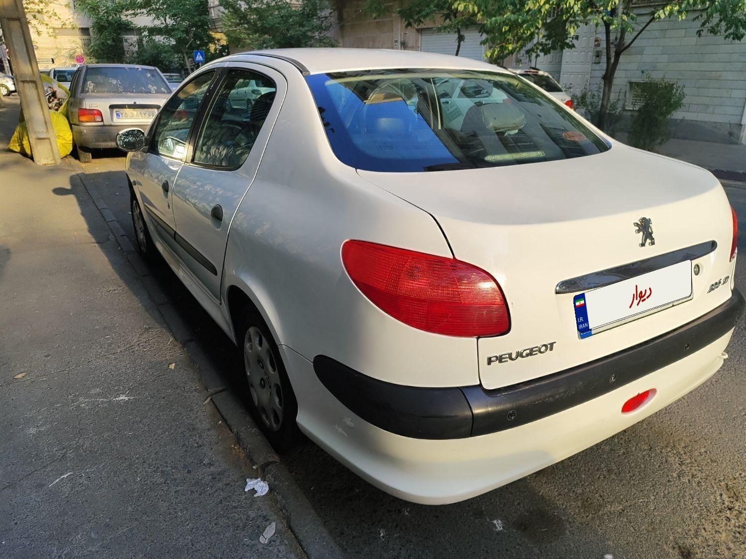 پژو ۲۰۶ صندوق دار v9 - 1390