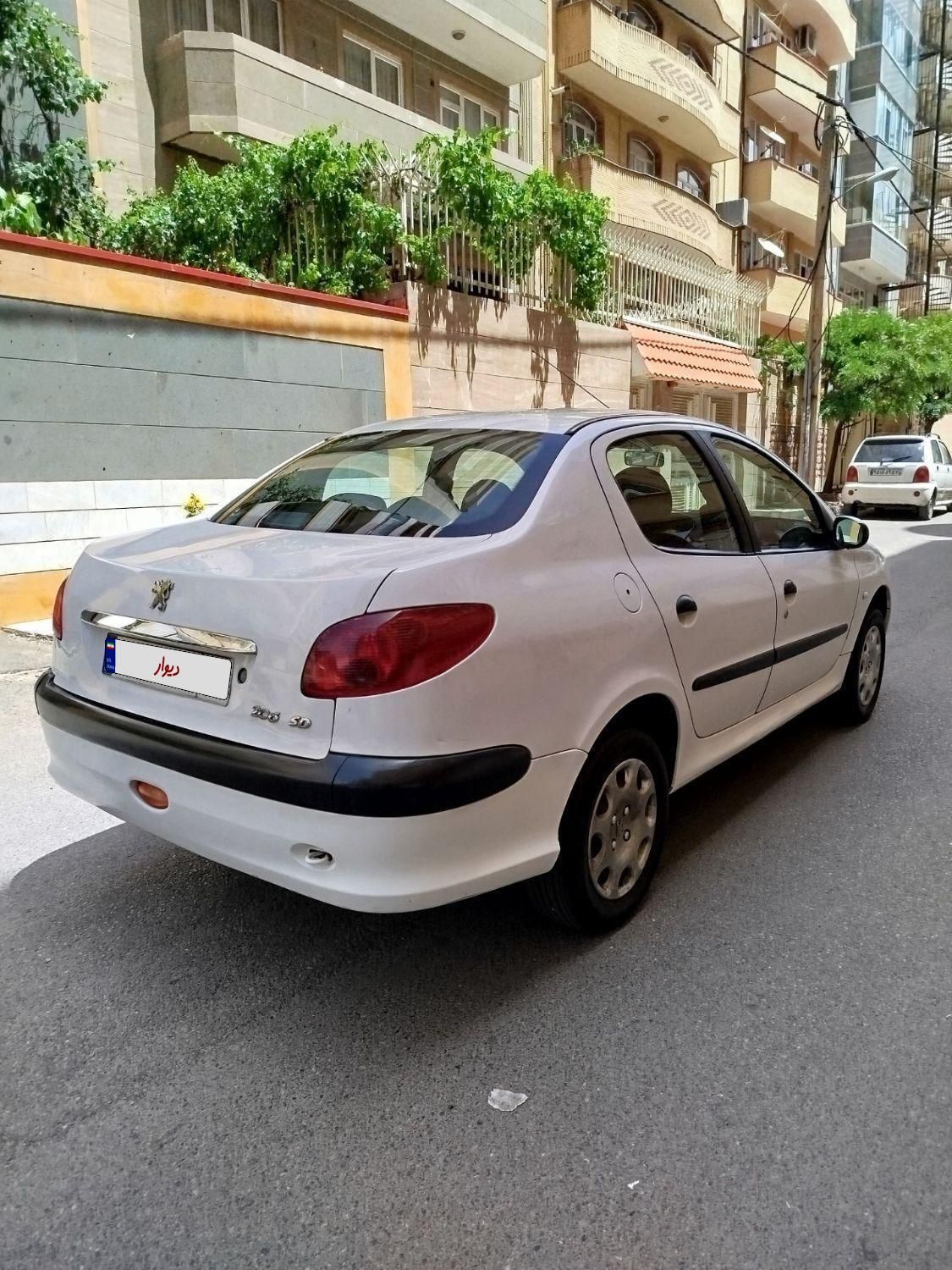 پژو ۲۰۶ صندوق دار v8 - 1390