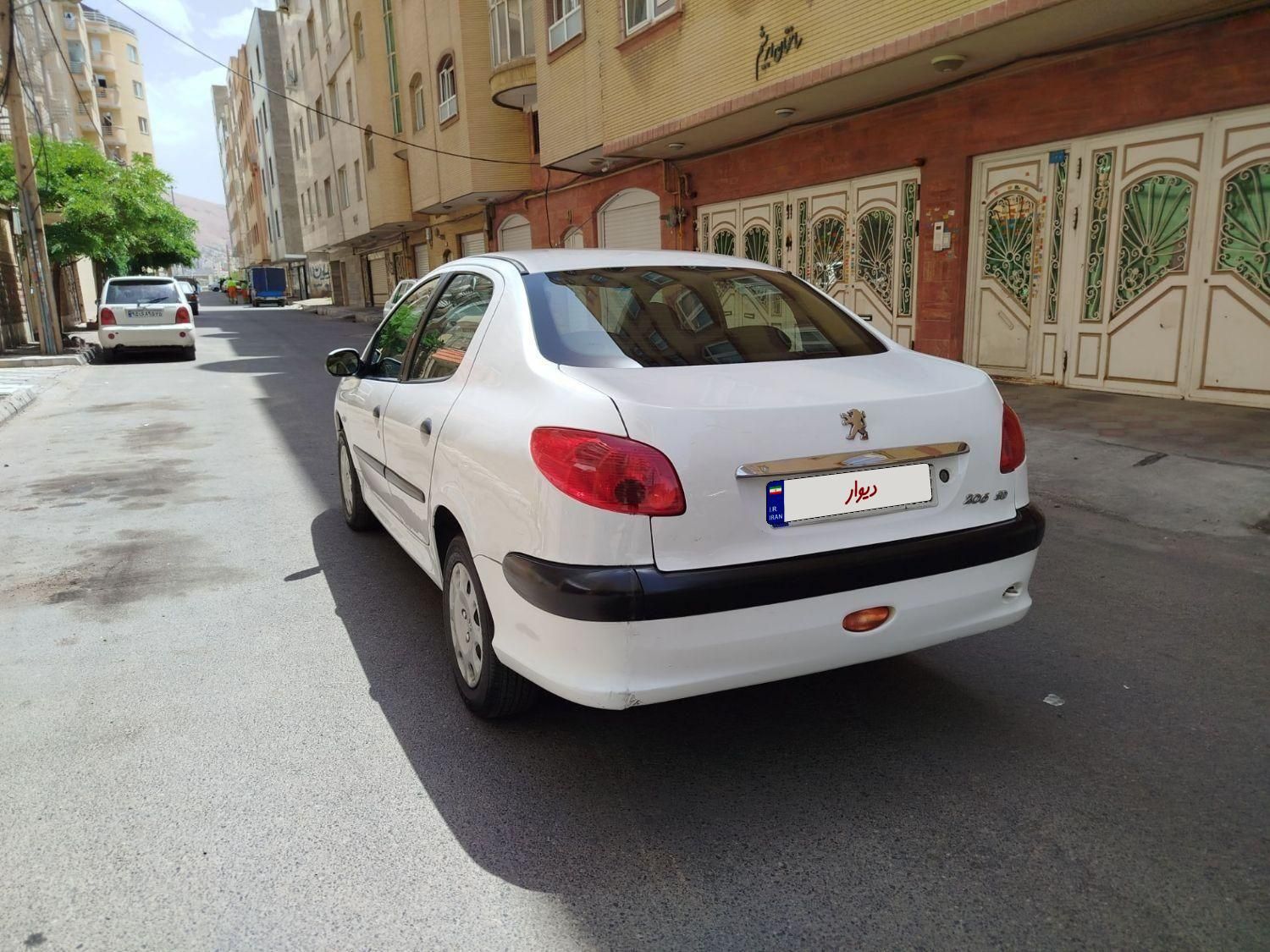 پژو ۲۰۶ صندوق دار v8 - 1390