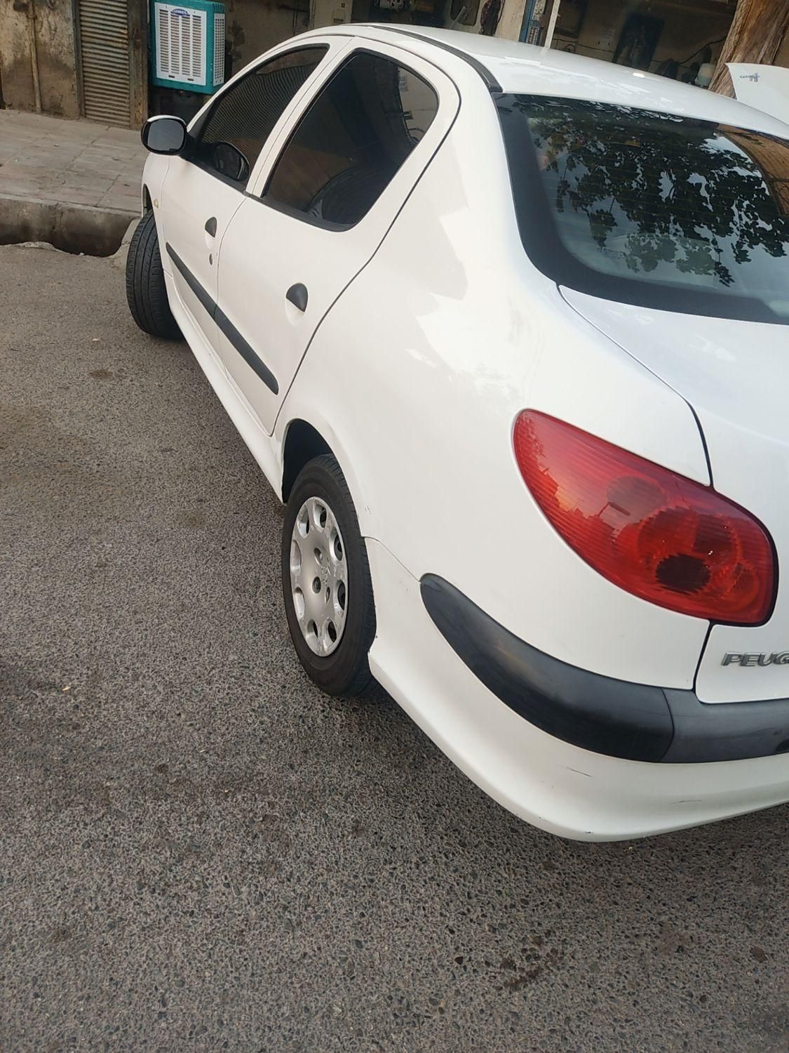 پژو ۲۰۶ صندوق دار v8 - 1394