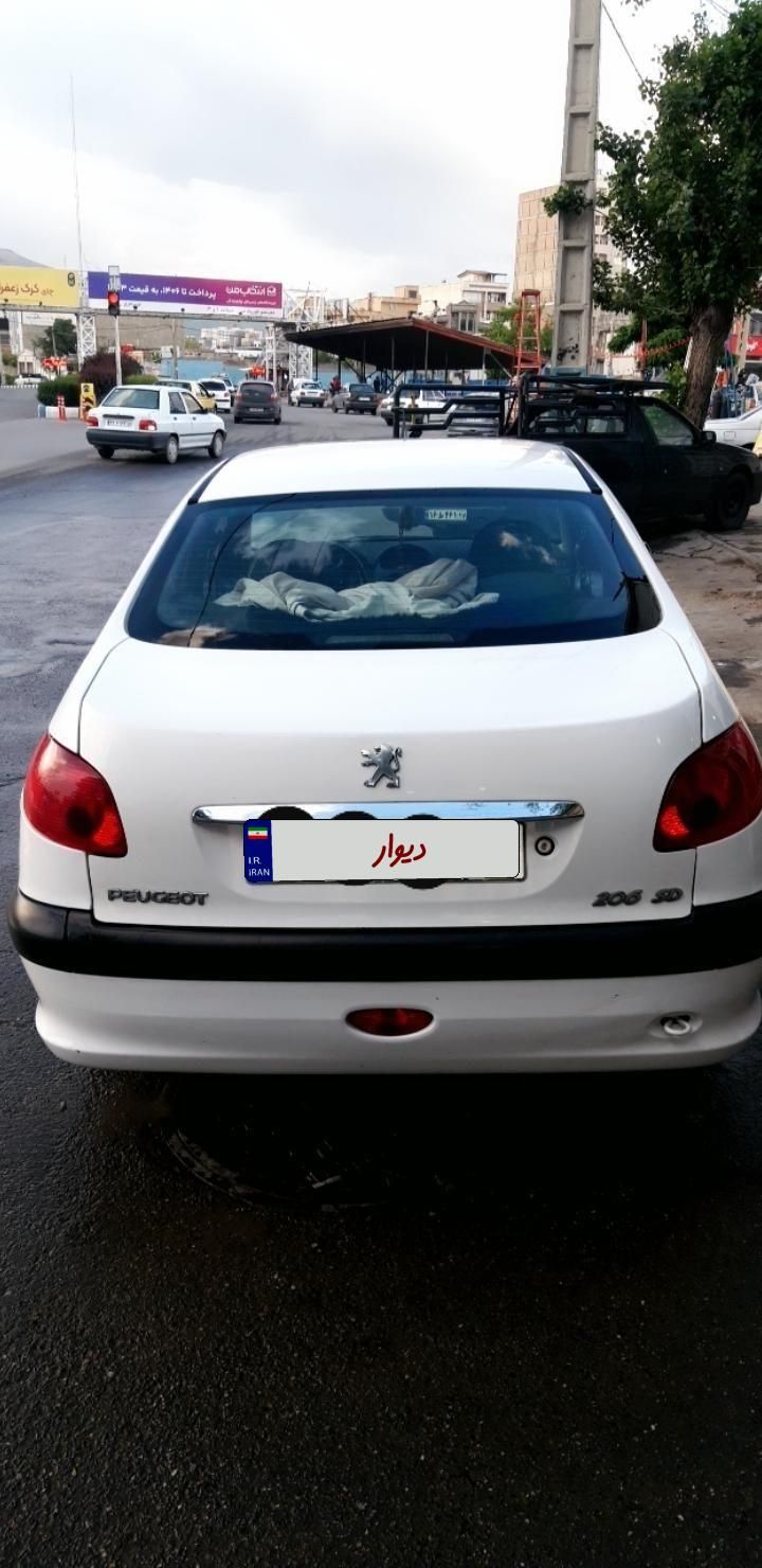 پژو ۲۰۶ صندوق دار v8 - 1394