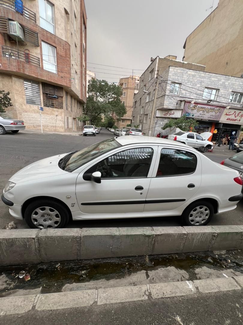 پژو ۲۰۶ صندوق دار v8 - 1394