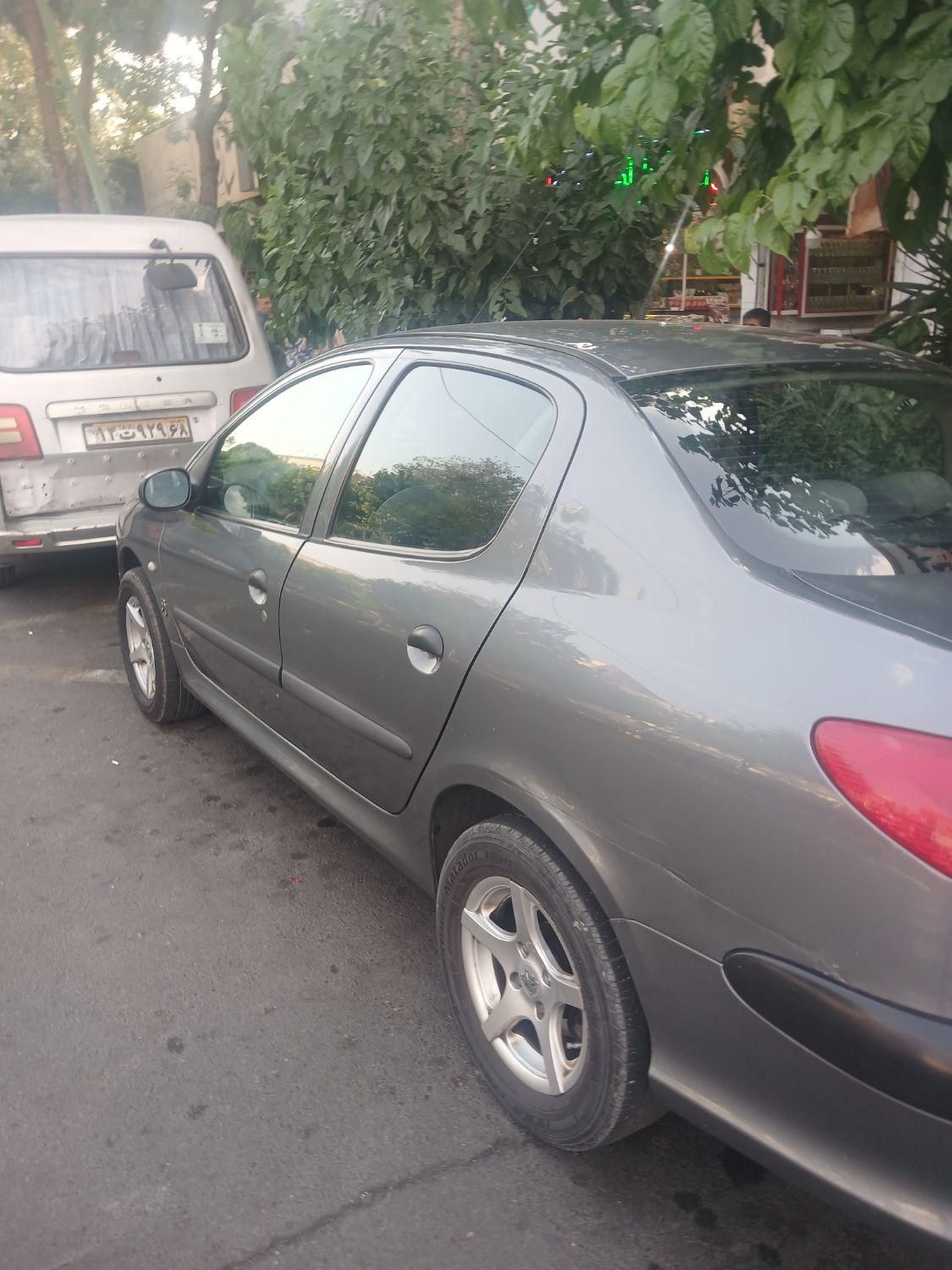 پژو ۲۰۶ صندوق دار v8 - 1396
