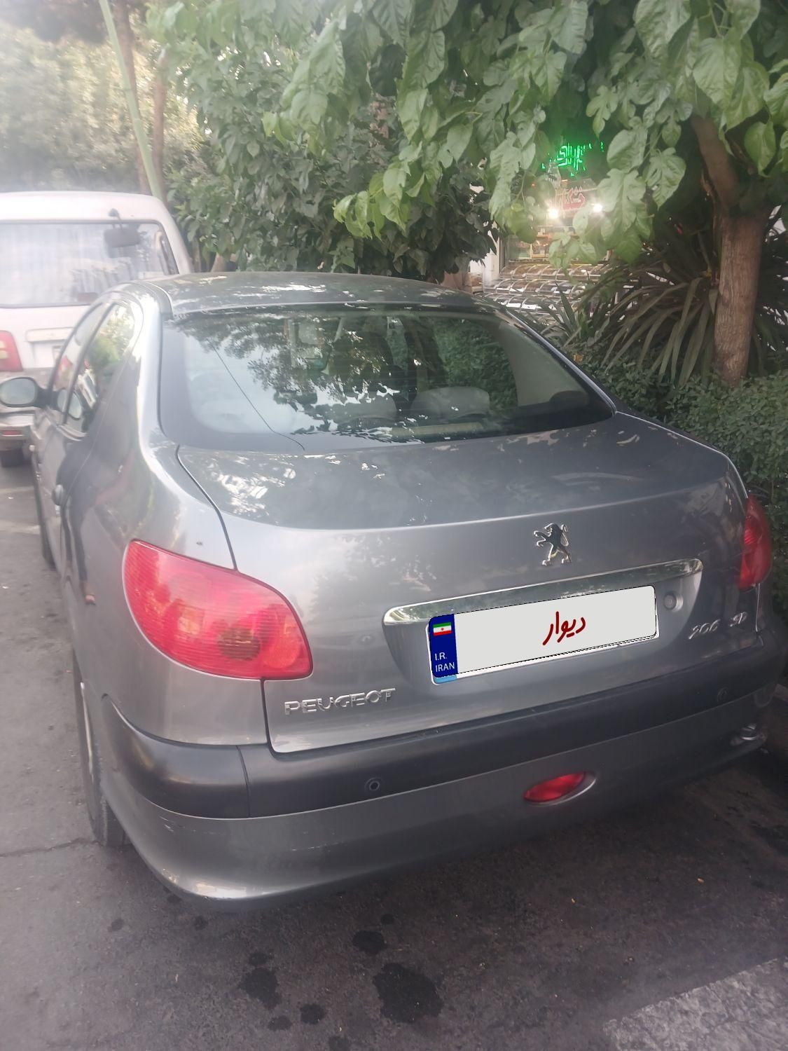 پژو ۲۰۶ صندوق دار v8 - 1396