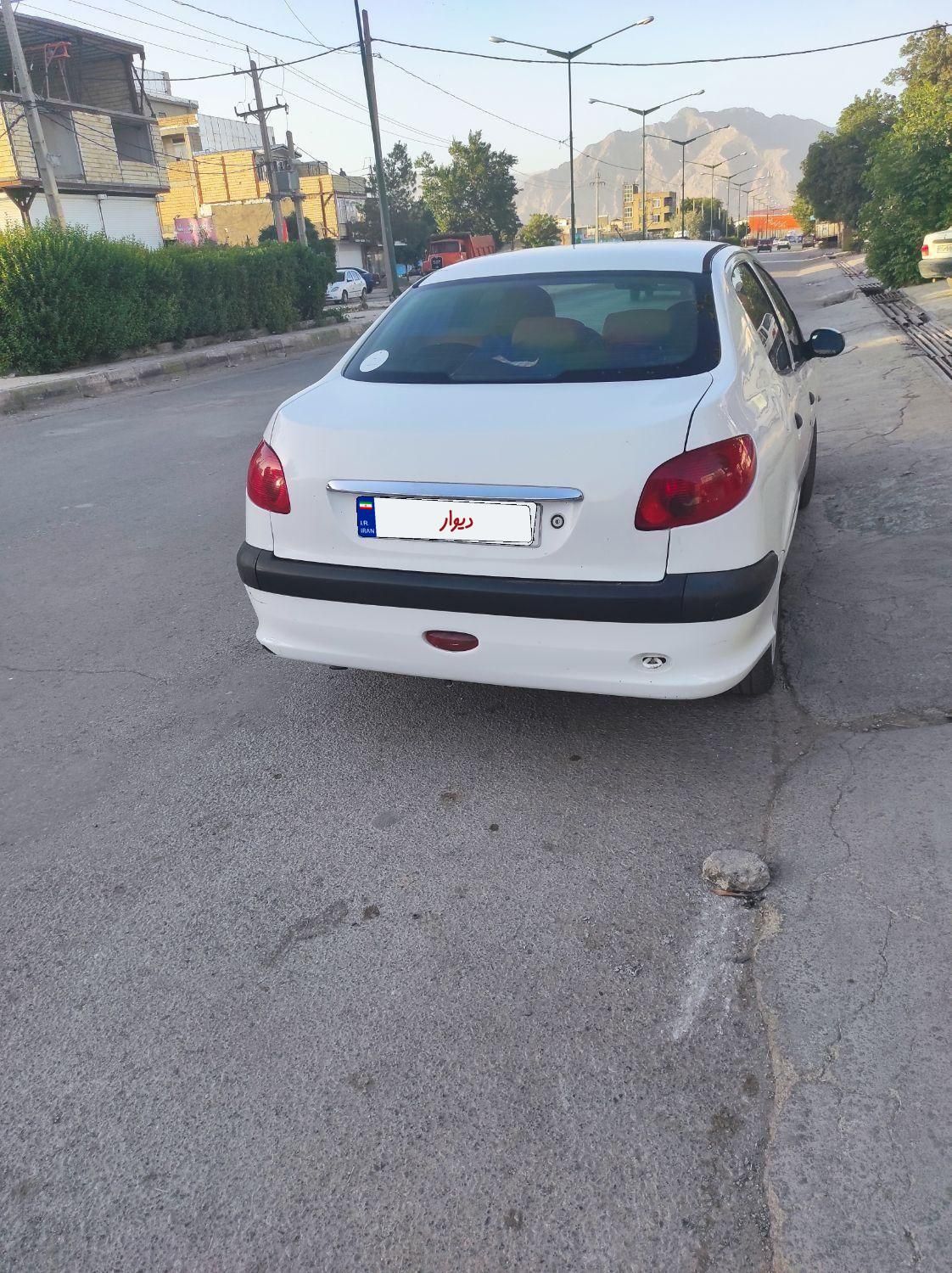 پژو ۲۰۶ صندوق دار v8 - 1394