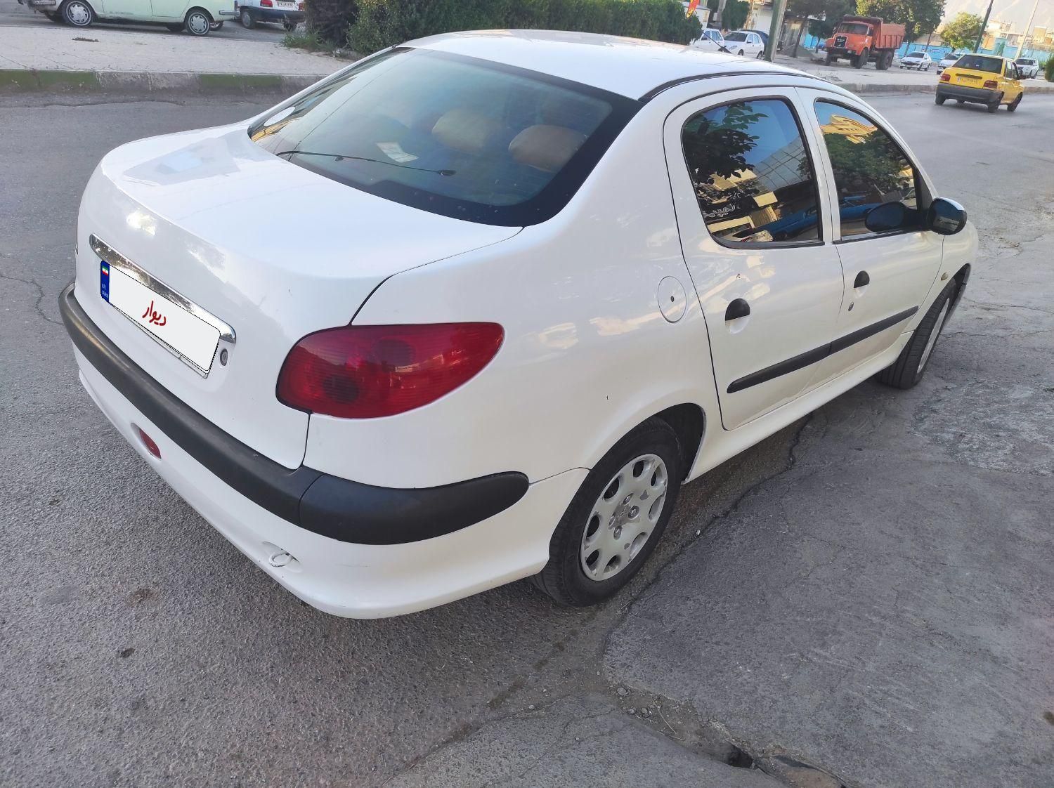 پژو ۲۰۶ صندوق دار v8 - 1394