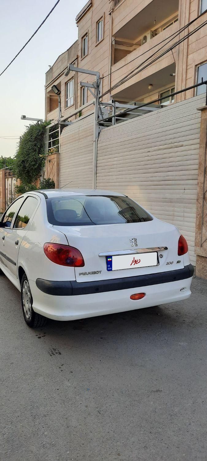 پژو ۲۰۶ صندوق دار v8 - 1393