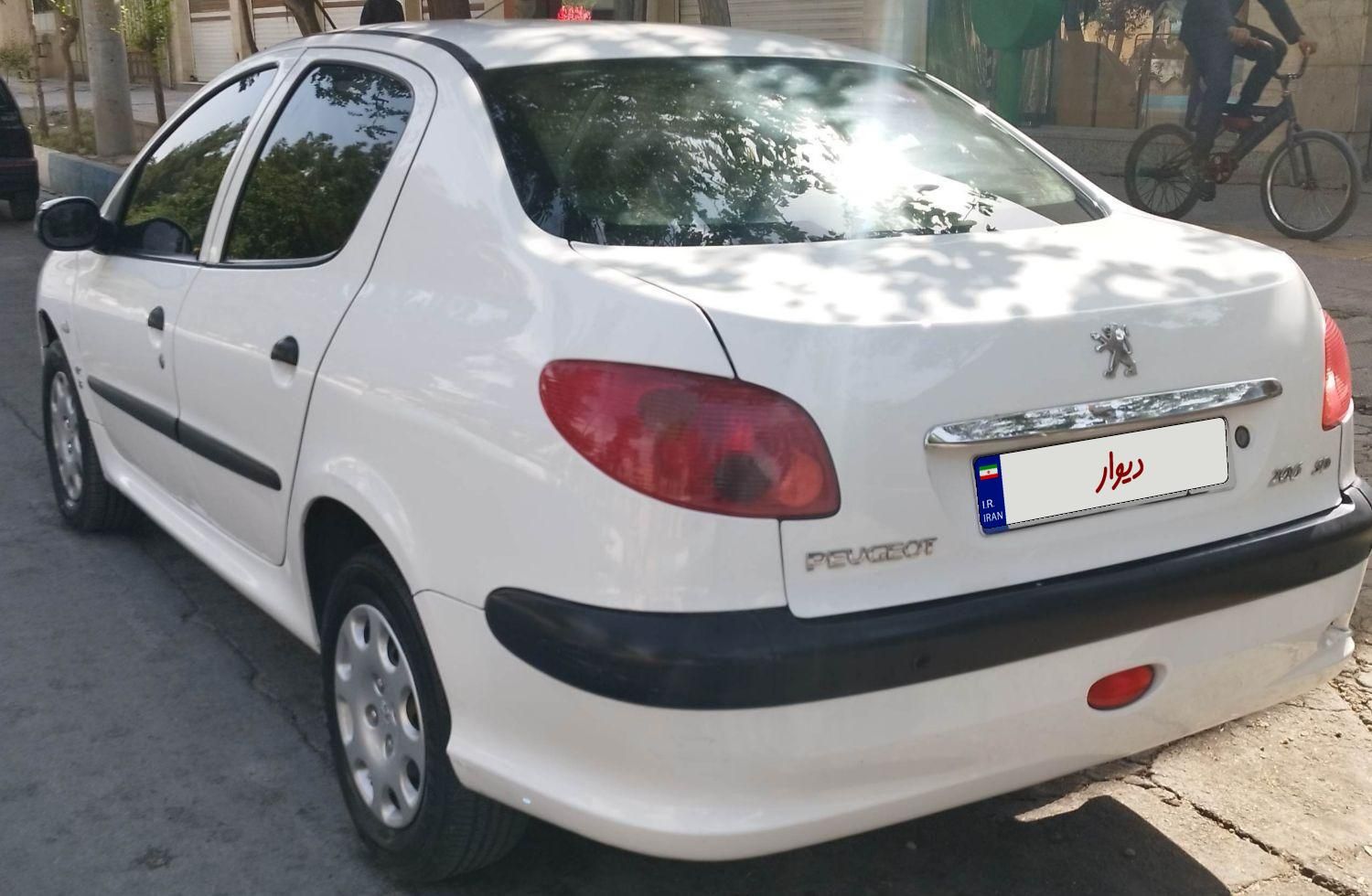 پژو ۲۰۶ صندوق دار v8 - 1396