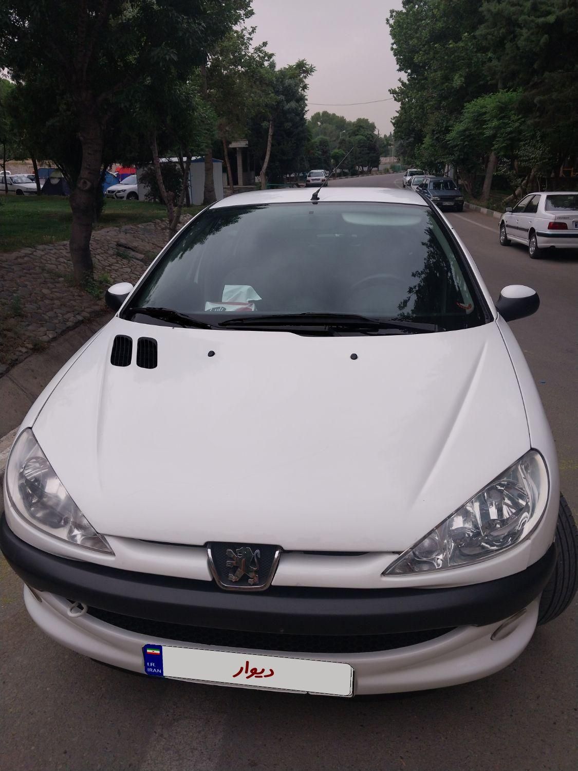 پژو ۲۰۶ صندوق دار v8 - 1397