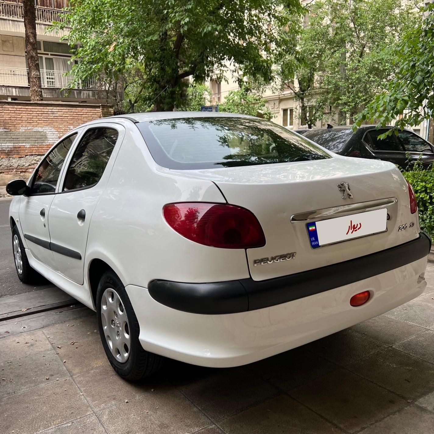 پژو ۲۰۶ صندوق دار v8 - 1390