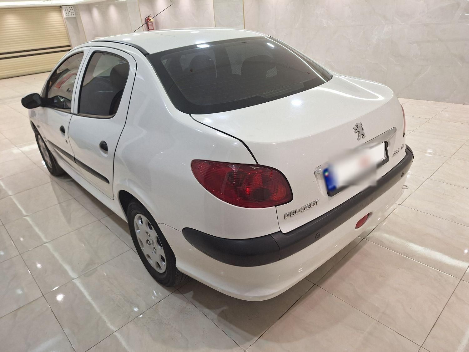 پژو ۲۰۶ صندوق دار v8 - 1396