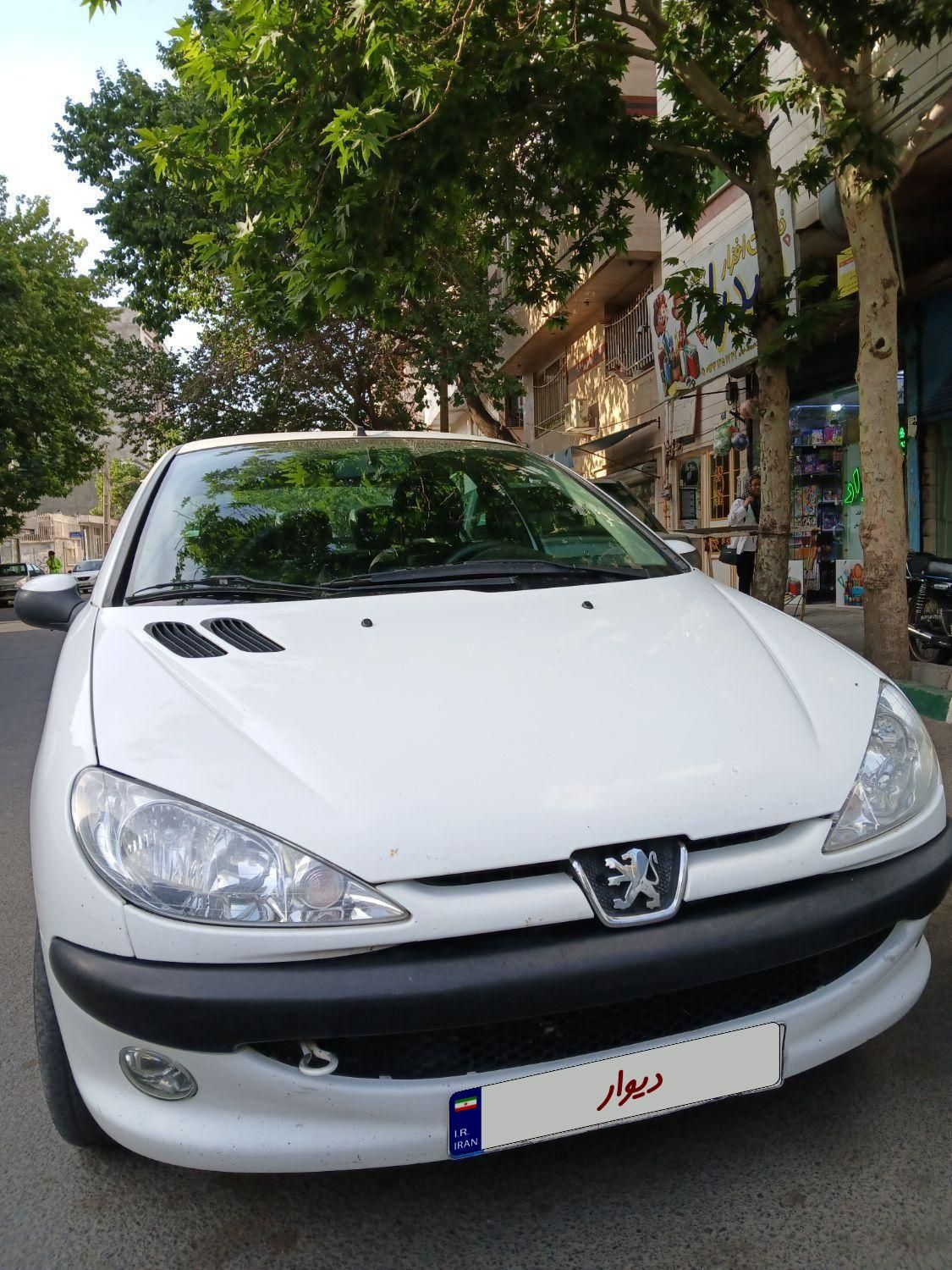 پژو ۲۰۶ صندوق دار v8 - 1397