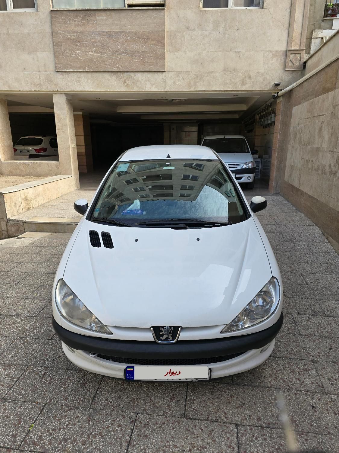 پژو ۲۰۶ صندوق دار v8 - 1396