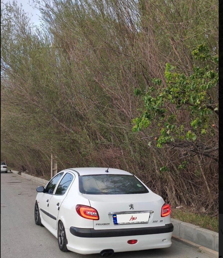 پژو ۲۰۶ صندوق دار v8 - 1393