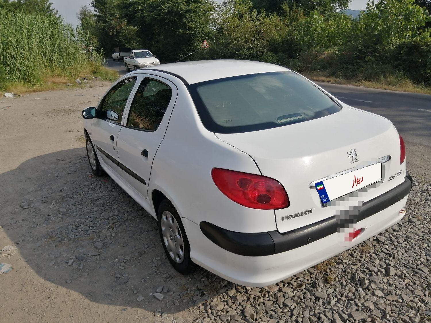 پژو ۲۰۶ صندوق دار v8 - 1395