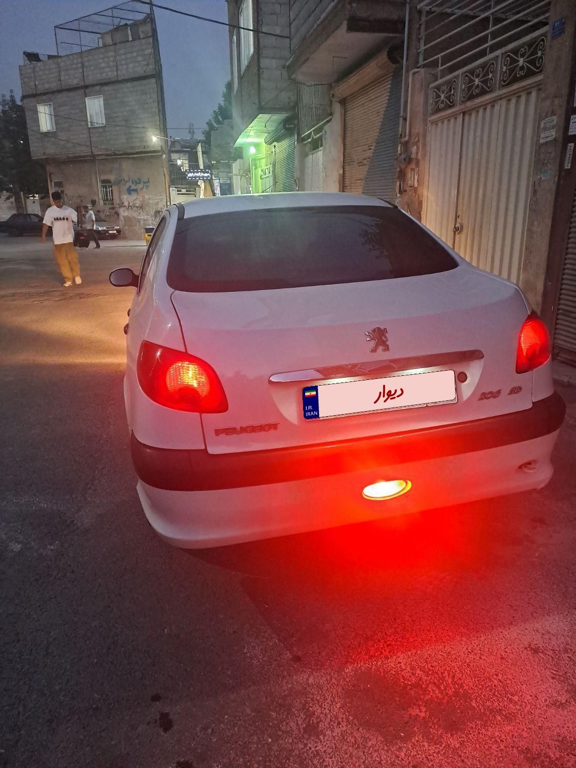 پژو ۲۰۶ صندوق دار v8 - 1396