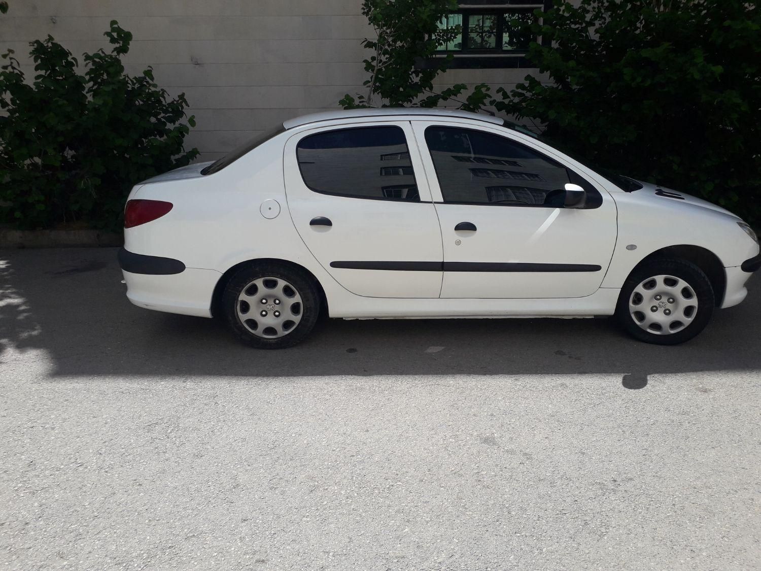 پژو ۲۰۶ صندوق دار v8 - 1397