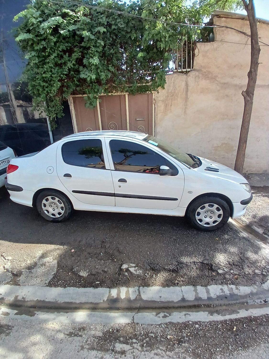 پژو ۲۰۶ صندوق دار v8 - 1396