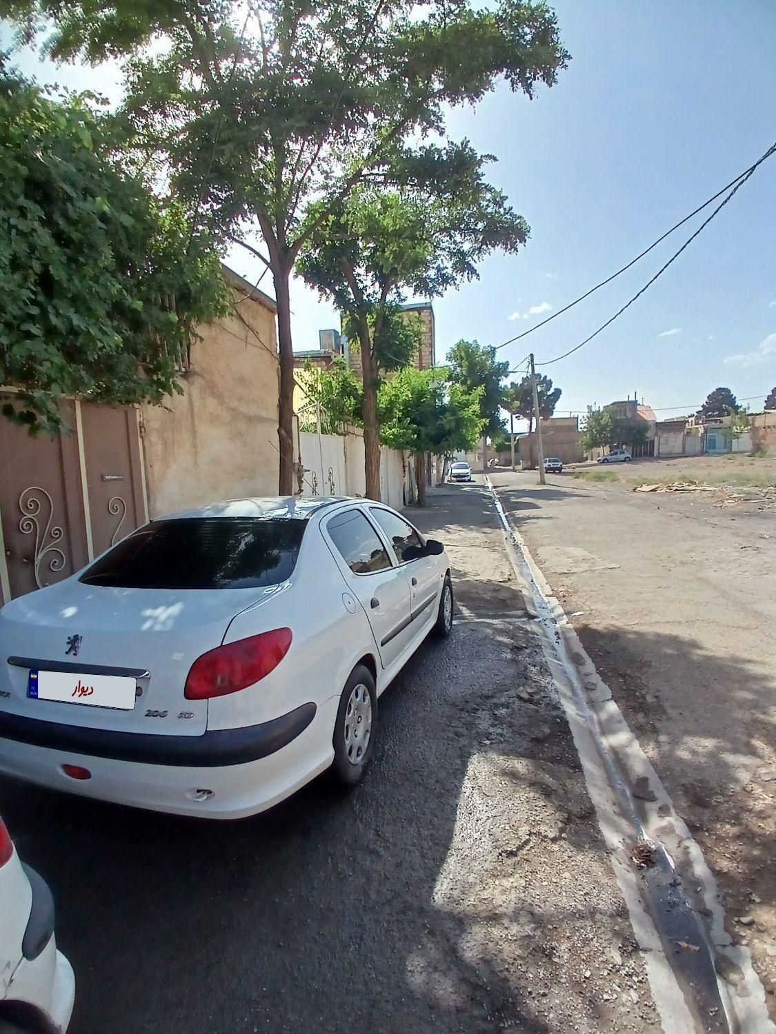 پژو ۲۰۶ صندوق دار v8 - 1396