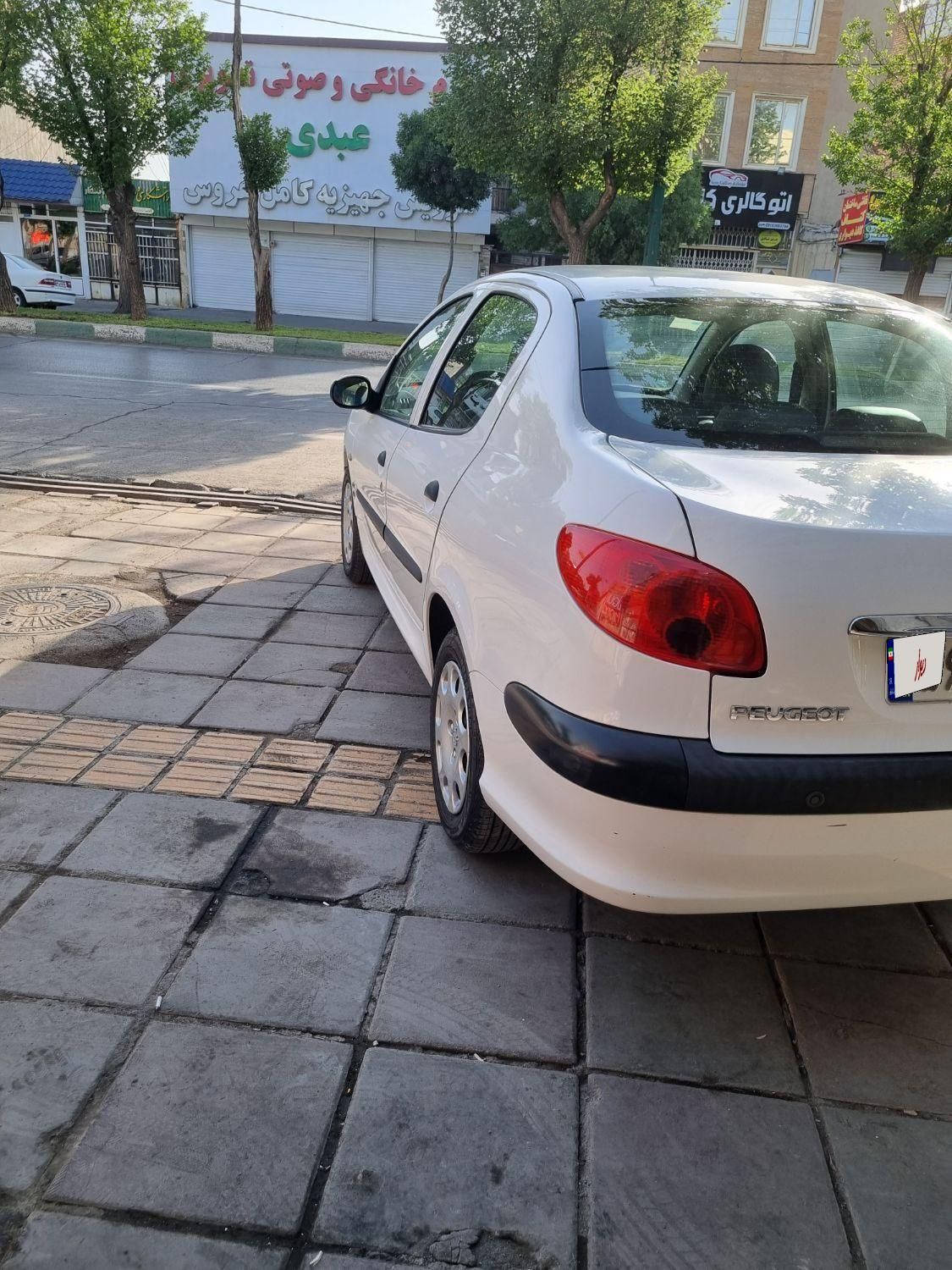 پژو ۲۰۶ صندوق دار v8 - 1396