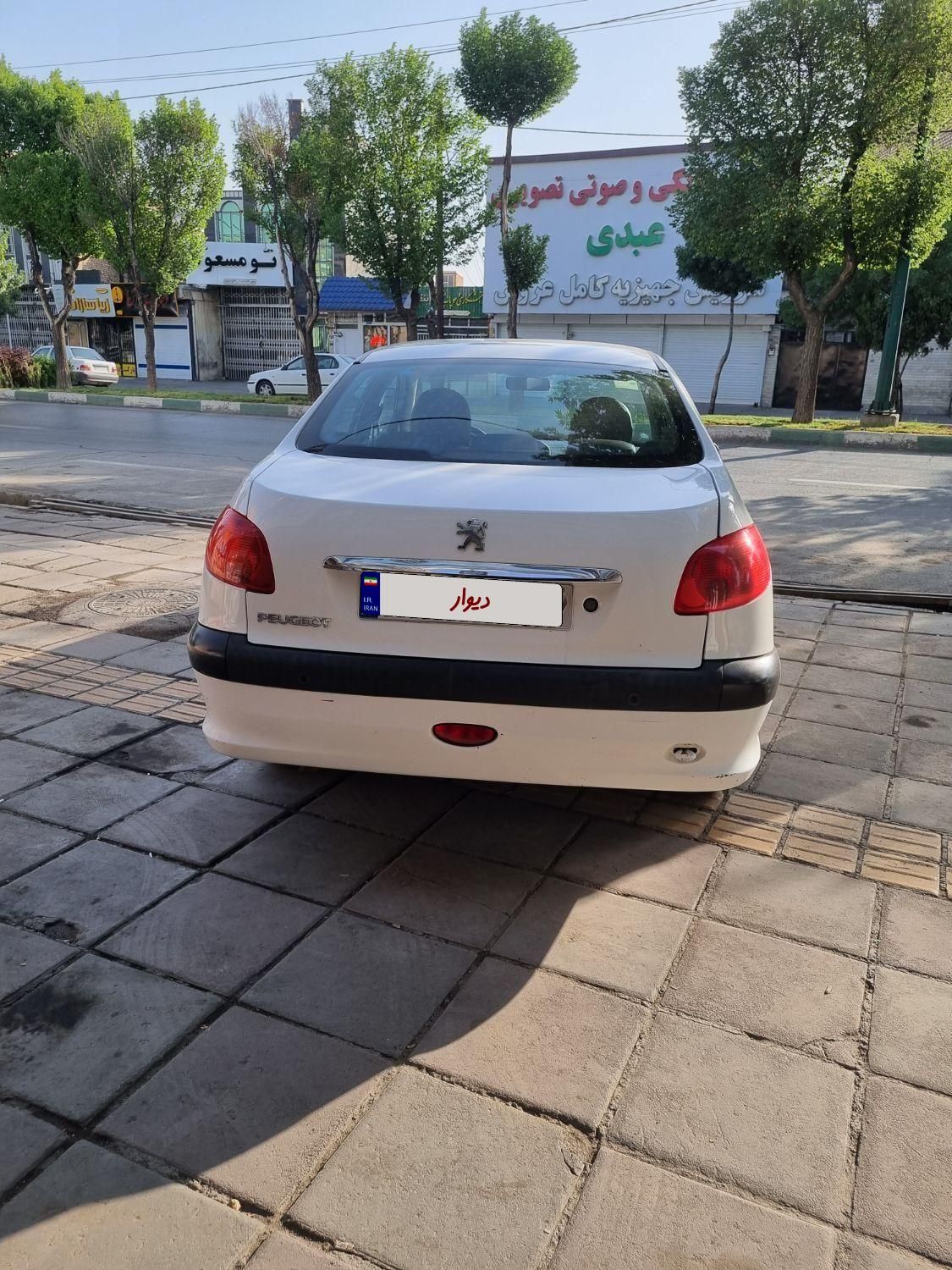 پژو ۲۰۶ صندوق دار v8 - 1396