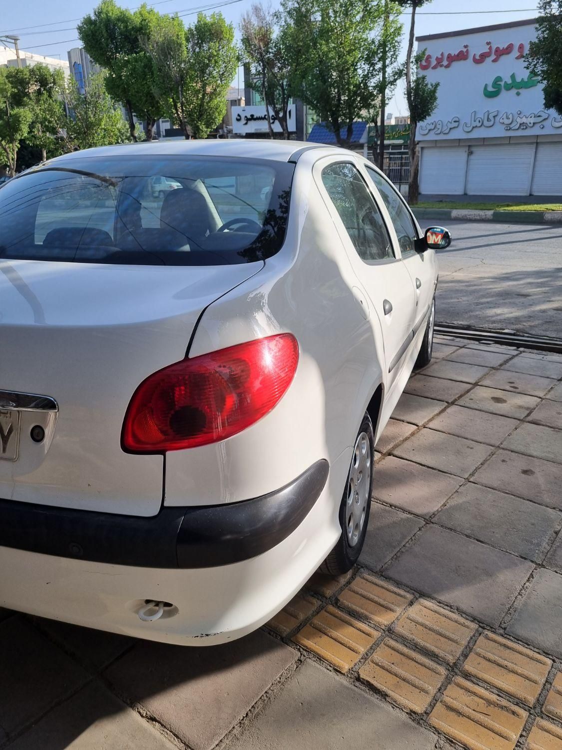 پژو ۲۰۶ صندوق دار v8 - 1396