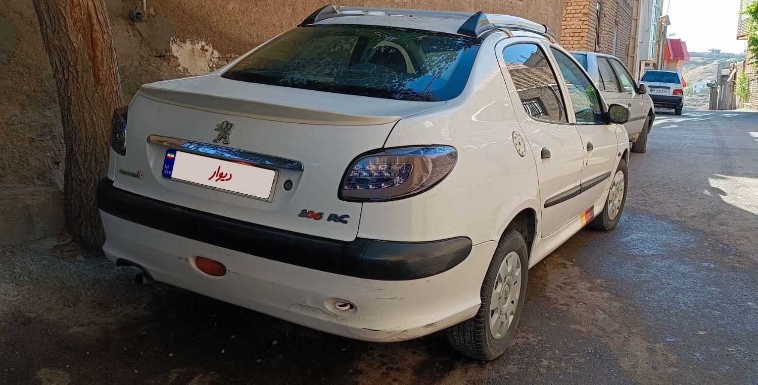 پژو ۲۰۶ صندوق دار v8 - 1391