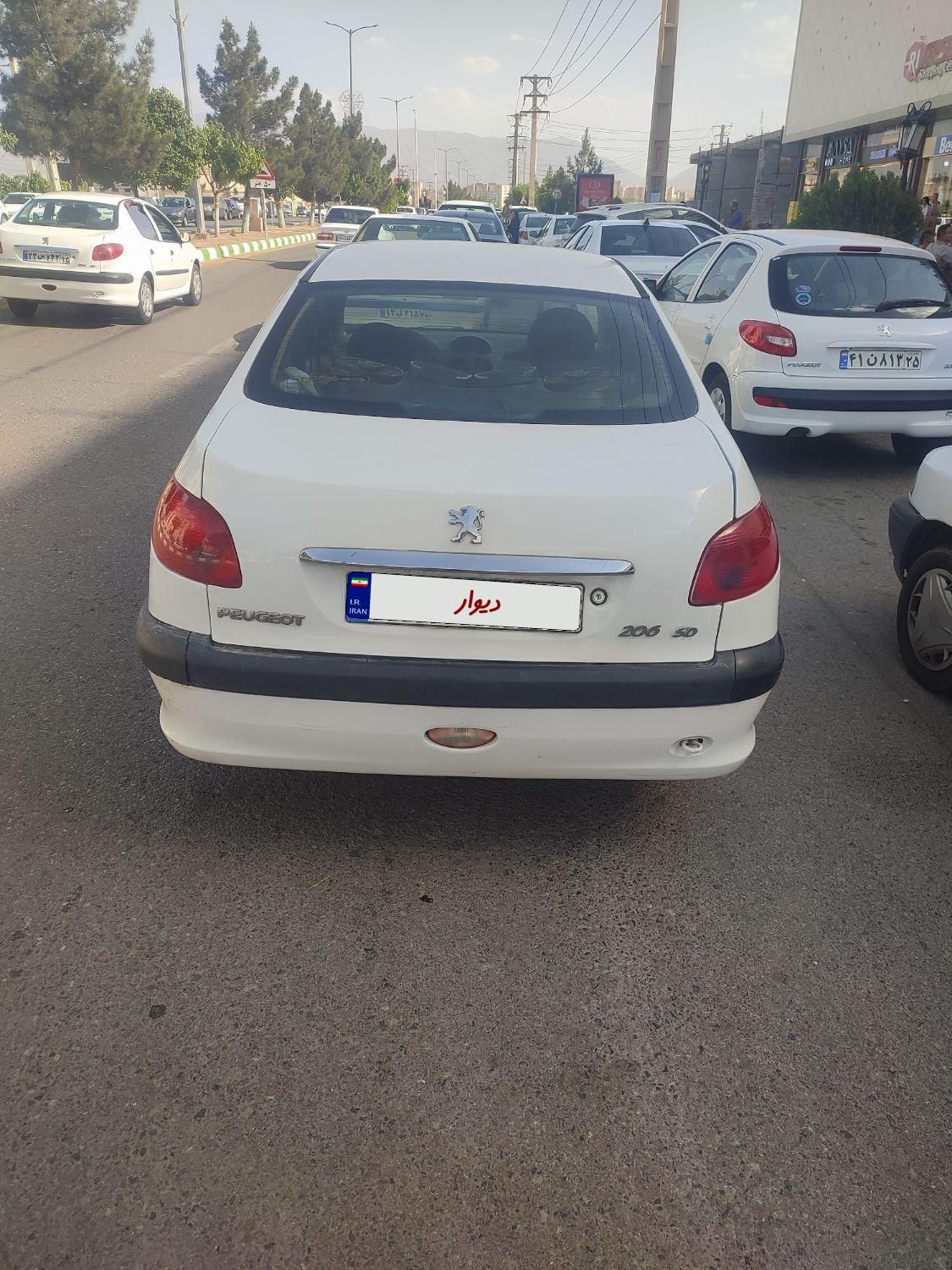 پژو ۲۰۶ صندوق دار v8 - 1391