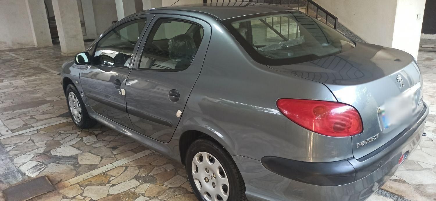پژو ۲۰۶ صندوق دار v8 - 1396