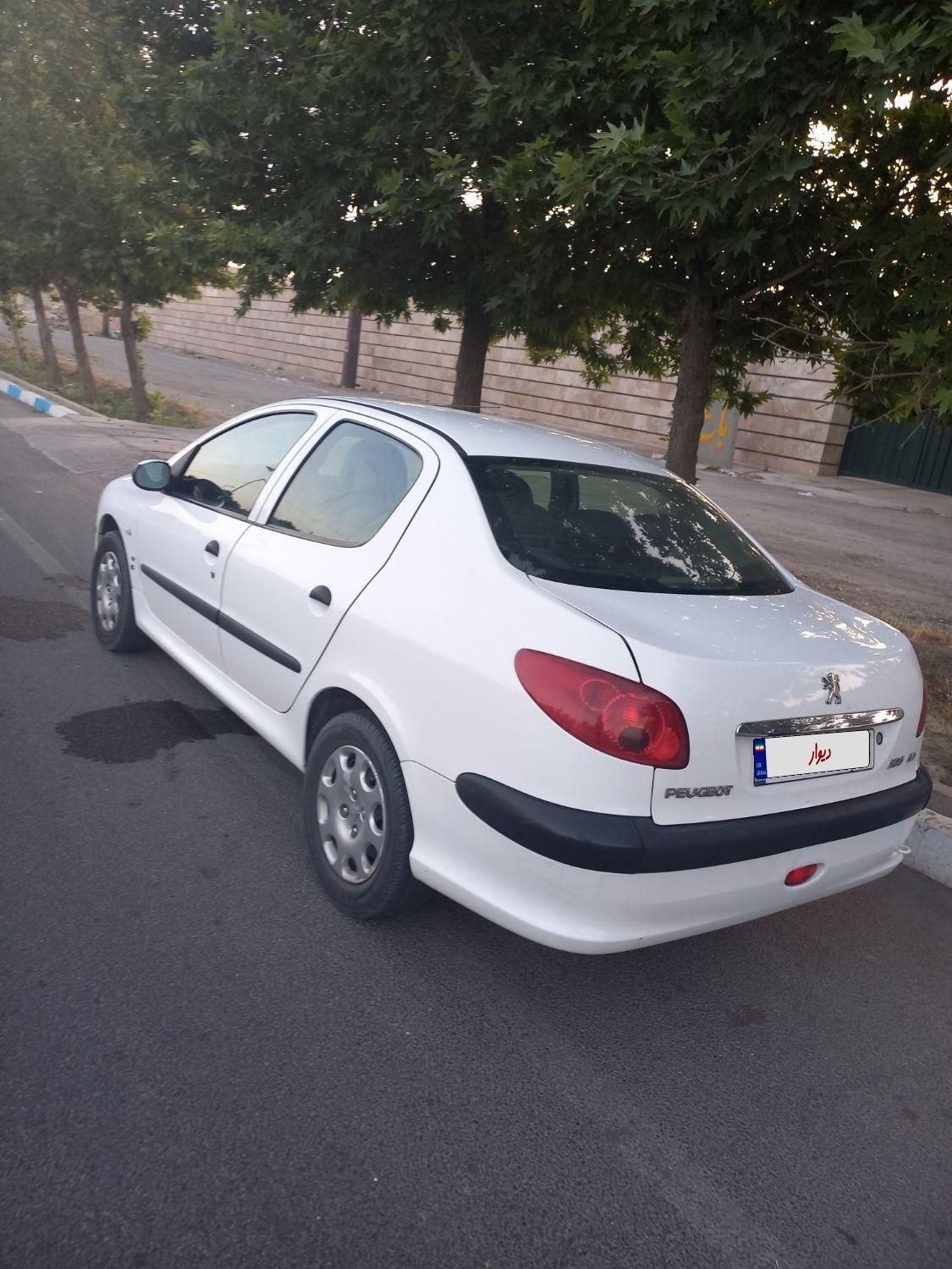 پژو ۲۰۶ صندوق دار v8 - 1395