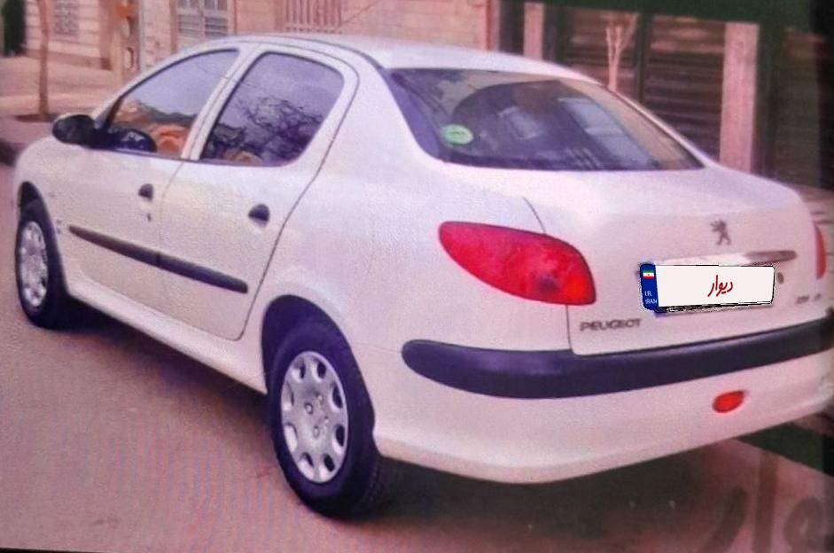 پژو ۲۰۶ صندوق دار v8 - 1396