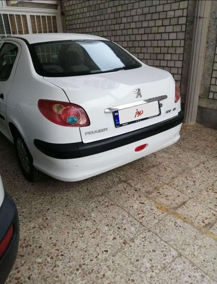 پژو ۲۰۶ صندوق دار v8 - 1393
