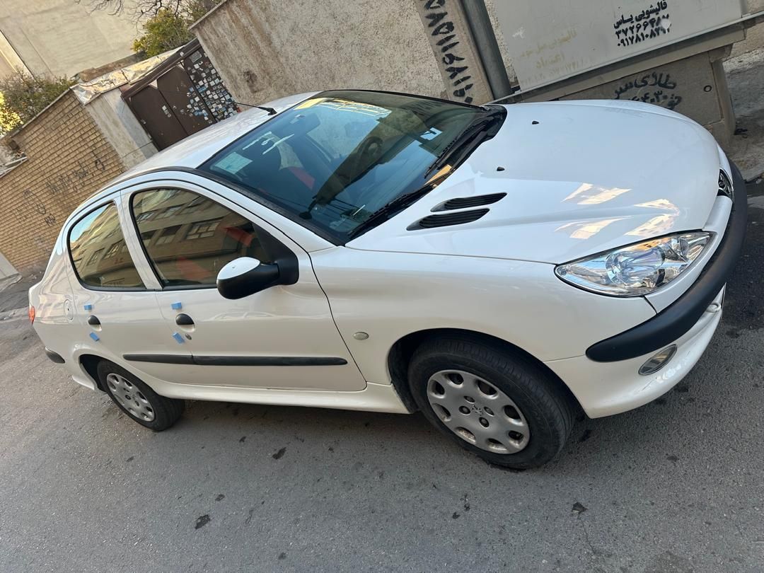 پژو ۲۰۶ صندوق دار v8 - 1396