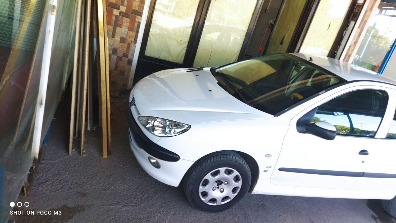 پژو ۲۰۶ صندوق دار v8 - 1396