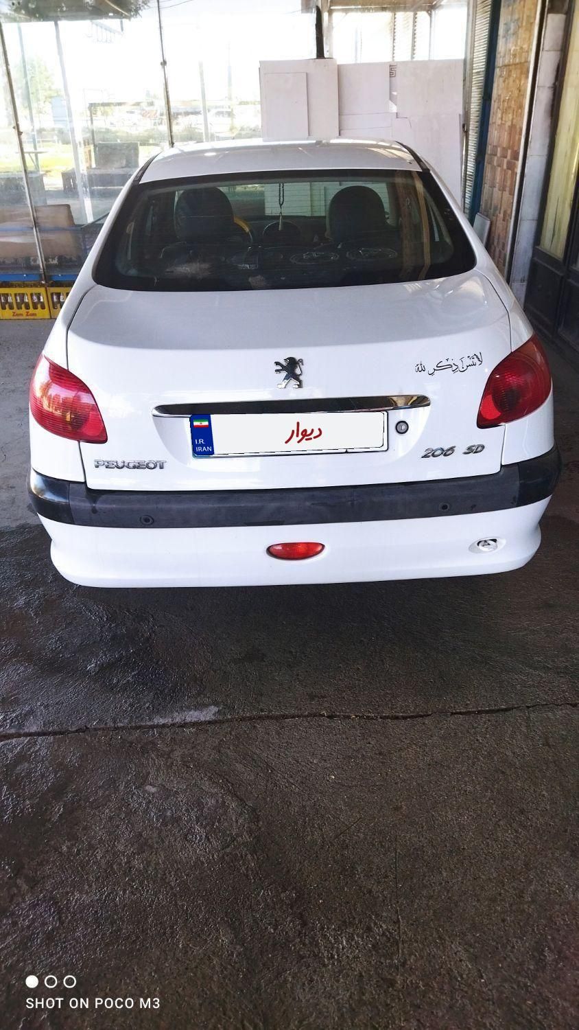 پژو ۲۰۶ صندوق دار v8 - 1396