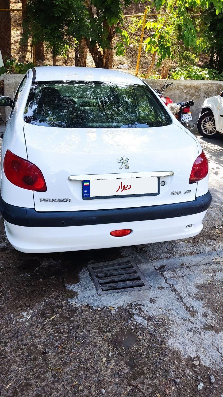 پژو ۲۰۶ صندوق دار v8 - 1396