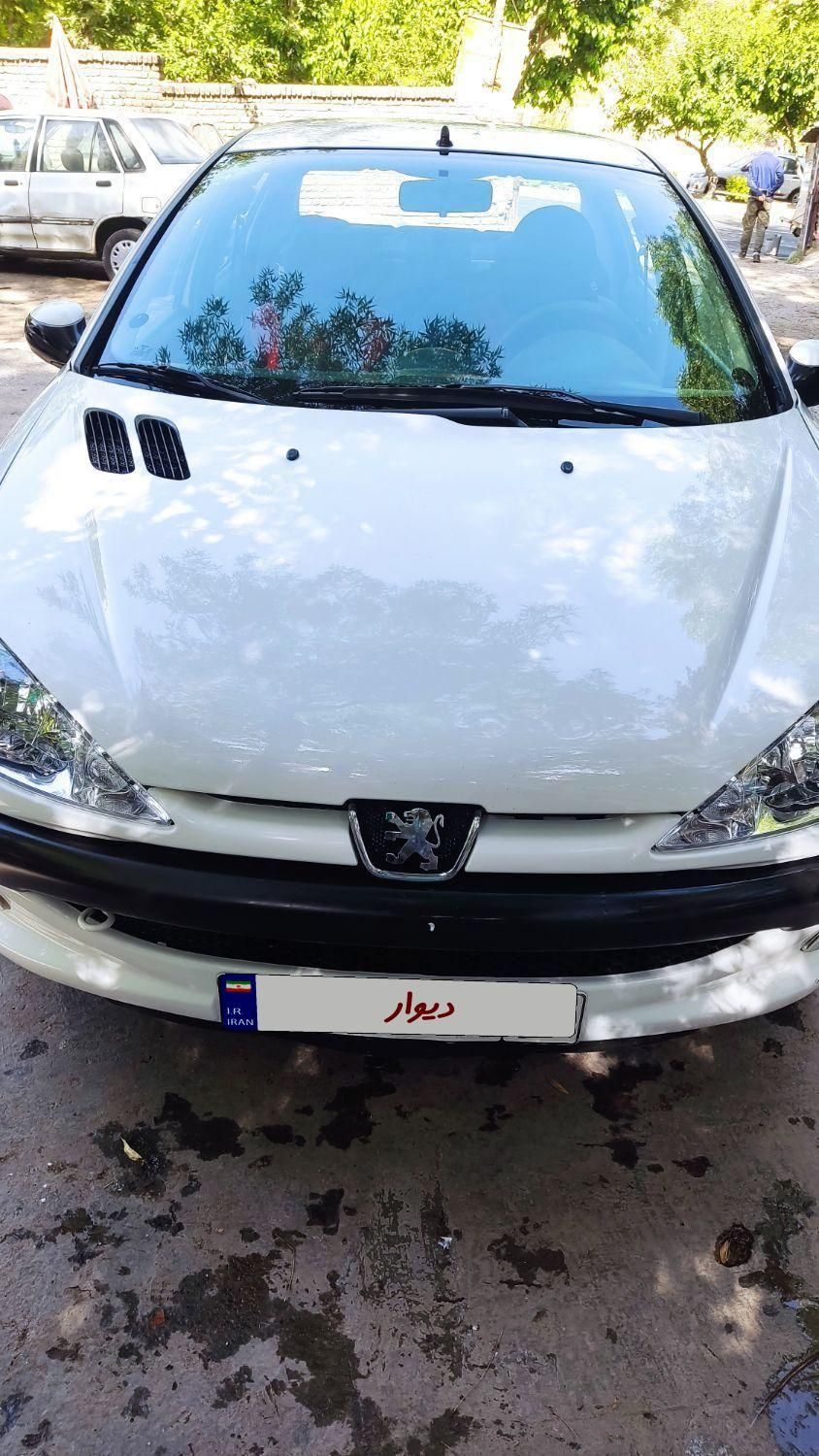 پژو ۲۰۶ صندوق دار v8 - 1396
