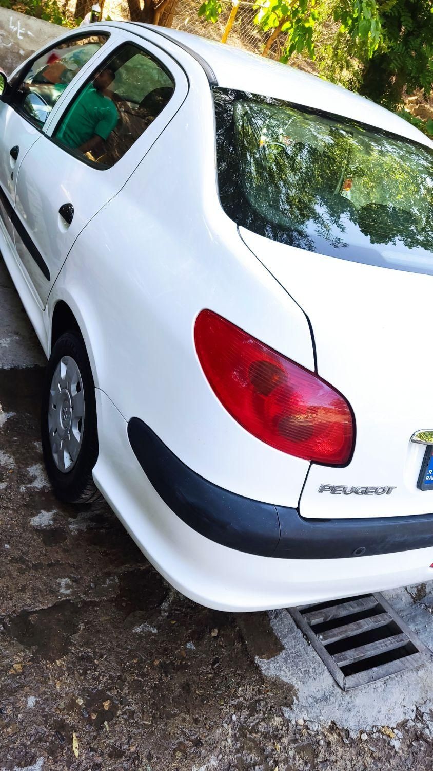 پژو ۲۰۶ صندوق دار v8 - 1396
