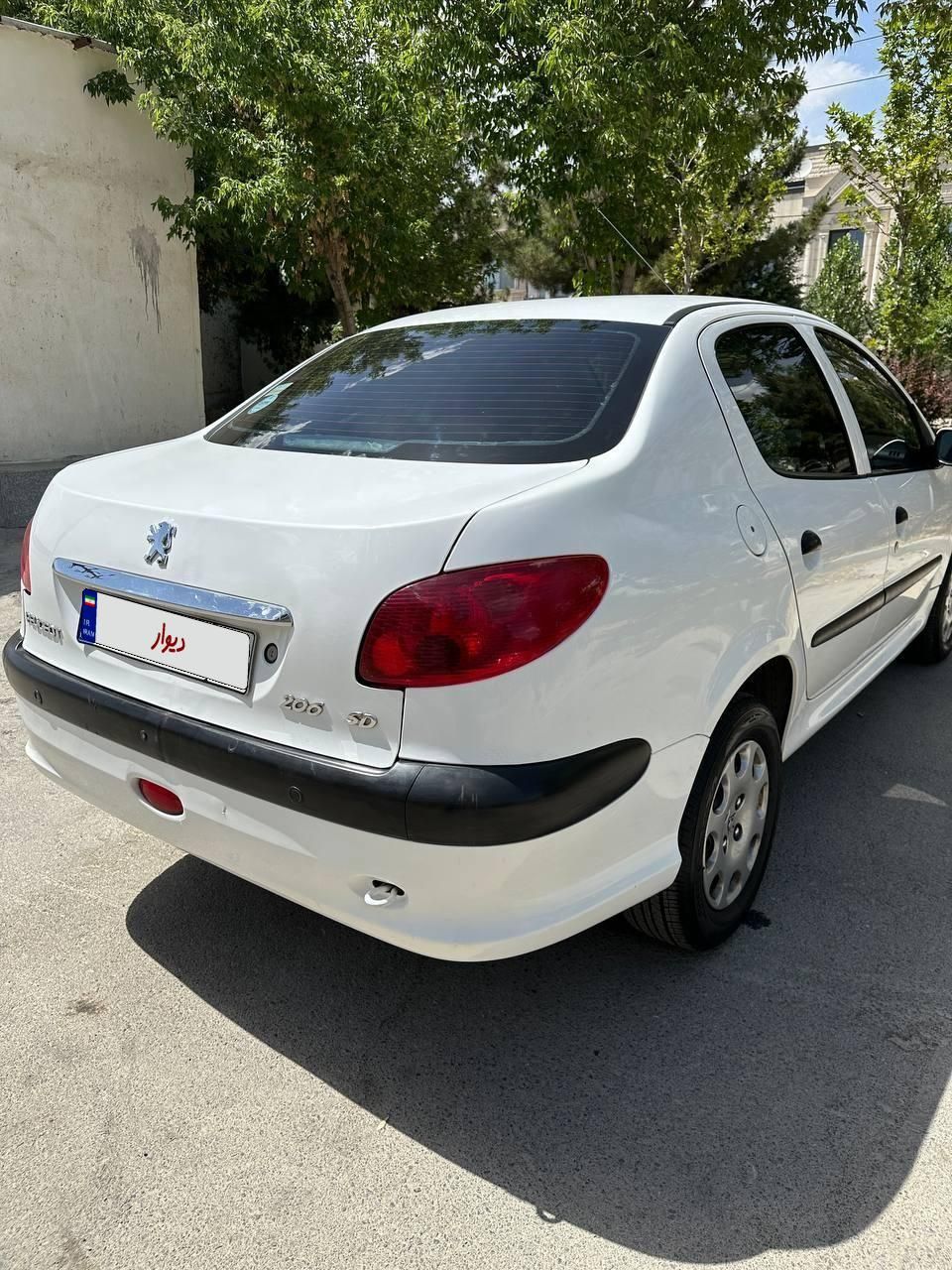 پژو ۲۰۶ صندوق دار v8 - 1397
