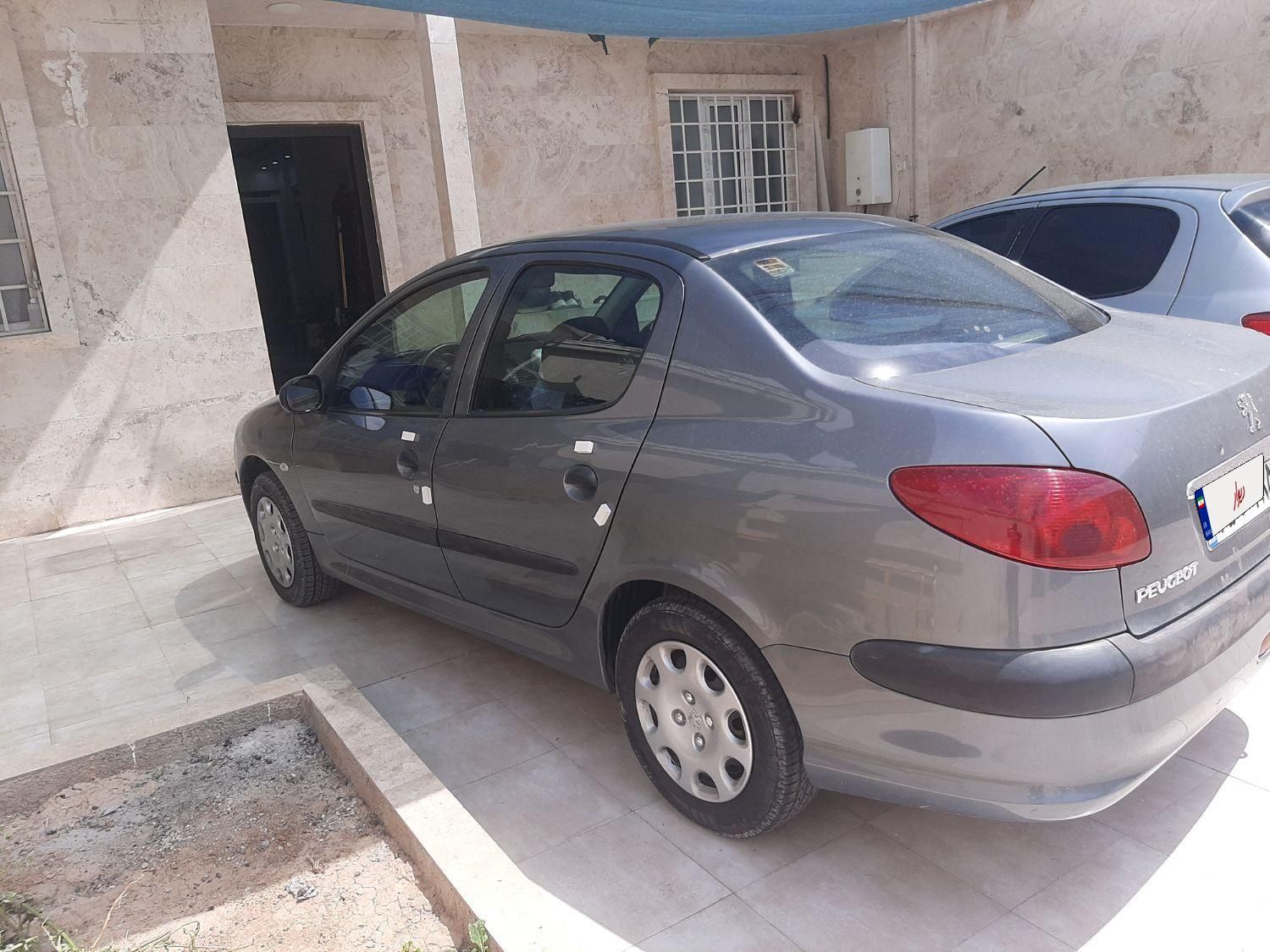 پژو ۲۰۶ صندوق دار v8 - 1394