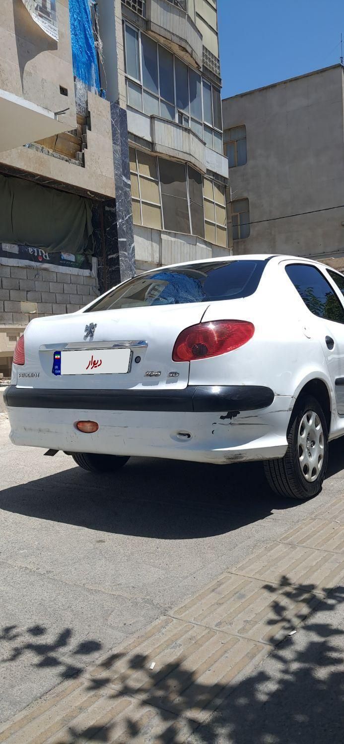 پژو ۲۰۶ صندوق دار v6 - 1390