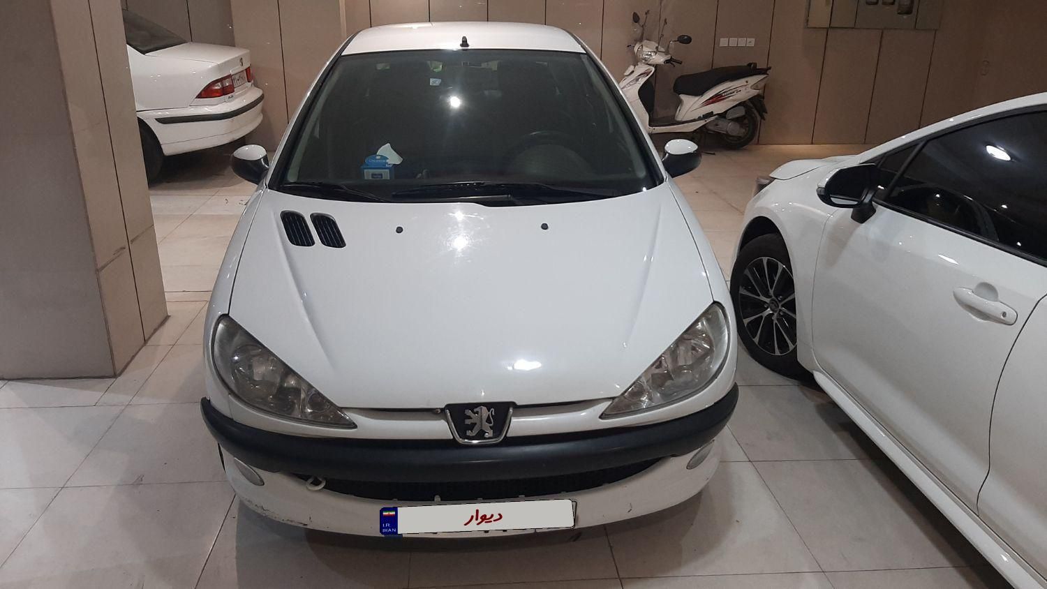 پژو ۲۰۶ صندوق دار v8 - 1396