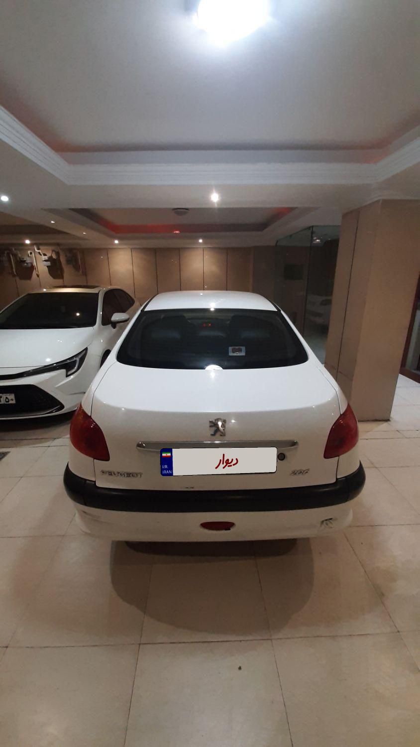 پژو ۲۰۶ صندوق دار v8 - 1396