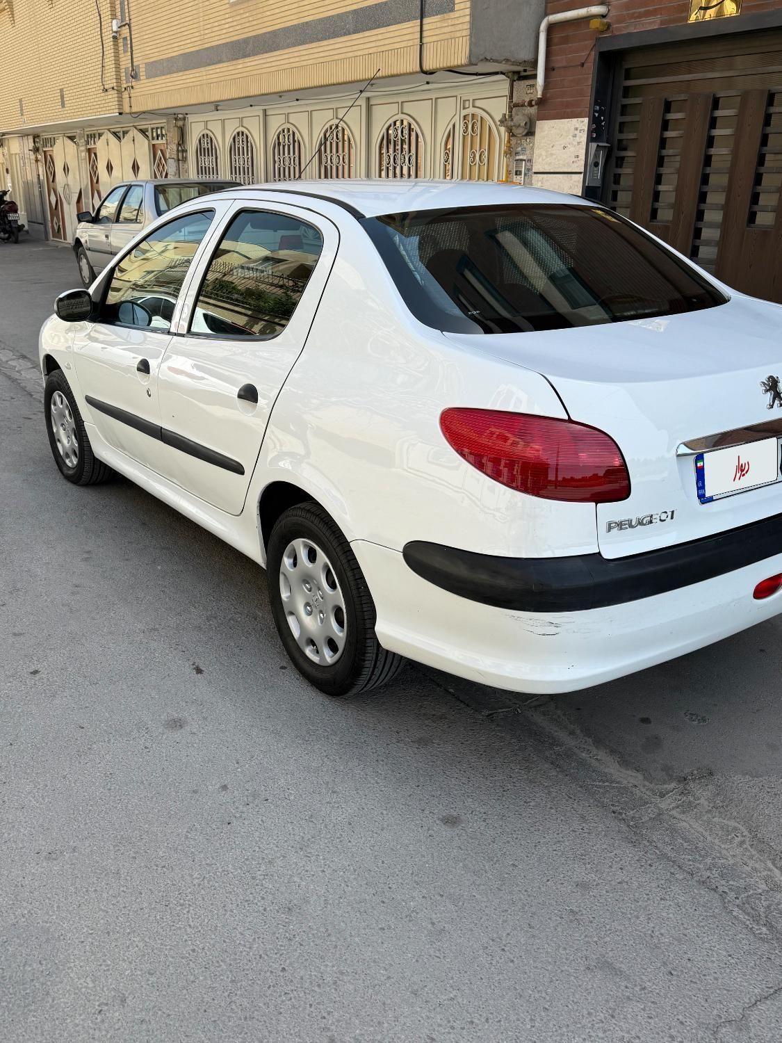 پژو ۲۰۶ صندوق دار v8 - 1391