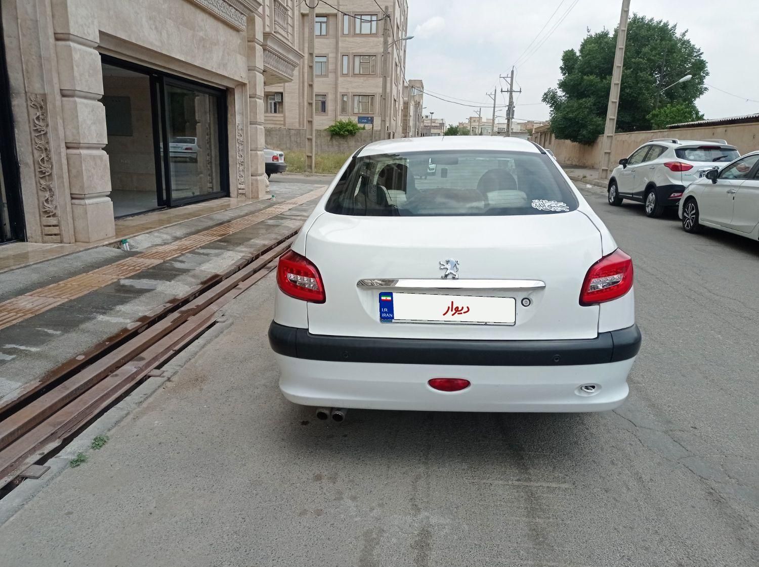 پژو ۲۰۶ صندوق دار v8 - 1397